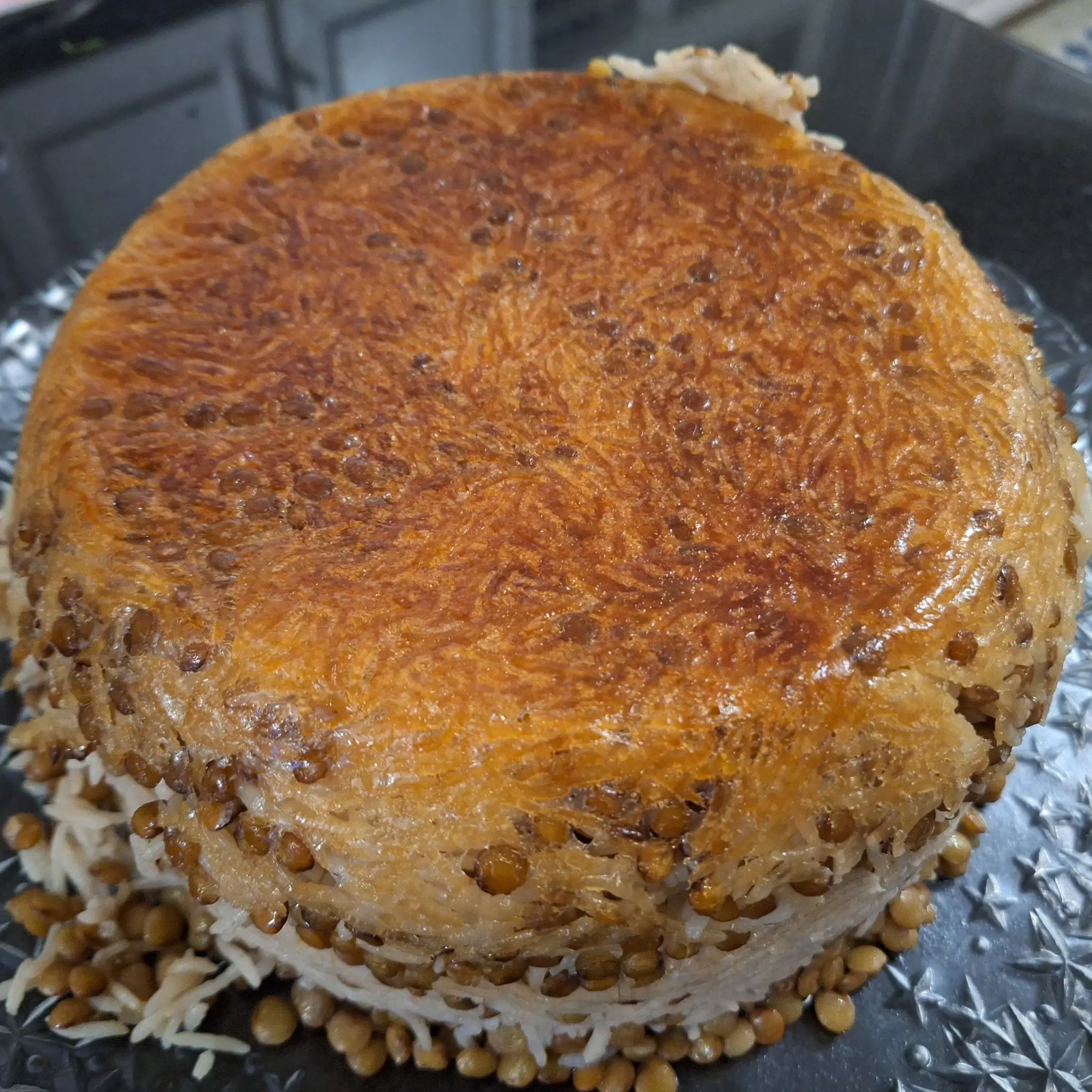 Persian Adas Polo with Crispy Tahdig Persian Adas Polo with lentils and golden crispy tahdig made in a PARS IRAN rice cooker